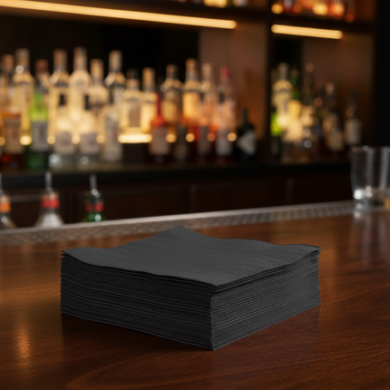 black beverage napkin on bar
